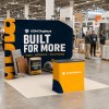 10x10 Curved FlexZip™ Trade Show Booth with Podium Counter