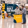 10x10 Curved FlexZip™ Trade Show Booth with Podium Counter