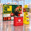 10x10 Straight FlexZip™ Trade Show Booth with TV-Mount Stand and Podium Counter