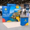10x10 Straight FlexZip™ Trade Show Booth with 2-Tier TV-Mount Shelving