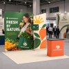 10x10 Modular FlexZip™ Media Trade Show Booth with TV Mount and Slanted-Top Panel