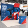 10x10 Modular FlexZip™ Trade Show Booth with TV Mount and Wave Panels