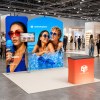 10x10 Modular FlexZip™ Media Trade Show Booth with TV Mount and Arch-Top Panel