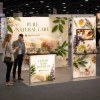 10x10 ProFrame™ SEG Lightbox Trade Show Booth with TV Mount and Display Shelf