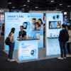 10x10 ProFrame™ SEG Lightbox Trade Show Booth with TV Mount and Display Shelf