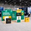 10x20 Straight FlexZip™ Trade Show Booth with L-Shaped Display, TV Mount and Two Headers