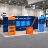 10x20 Straight FlexZip™ Trade Show Booth with Two L-Shaped Displays and TV Mounts